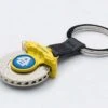 BRAKE DISC KEYCHAIN (6-POTS CALIPER) Yellow By AUTOart