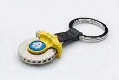 BRAKE DISC KEYCHAIN (6-POTS CALIPER) Yellow By AUTOart